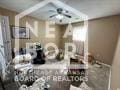 812 E Unity Rd E, Paragould, AR 72450 - kitchen featuring a ceiling fan