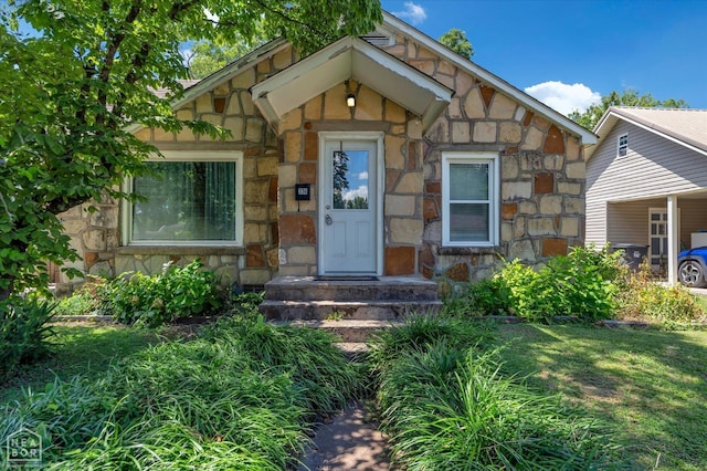 316 SE 2nd St SE, Walnut Ridge, AR 72476 - view of exterior entry featuring stone siding