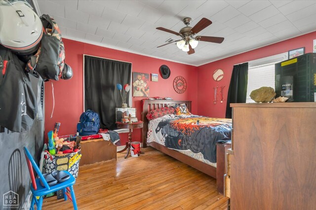 316 SE 2nd St SE, Walnut Ridge, AR 72476 - bedroom featuring wood finished floors, ceiling fan, and crown molding