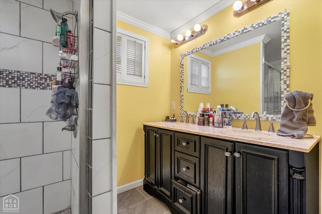 316 SE 2nd St SE, Walnut Ridge, AR 72476 - full bathroom featuring ornamental molding, double vanity, tile patterned flooring, and a shower with door