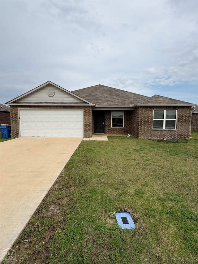 3726 Glitterman Dr, Jonesboro, AR 72404 - ranch-style home with an attached garage, concrete driveway, brick siding, and a front yard