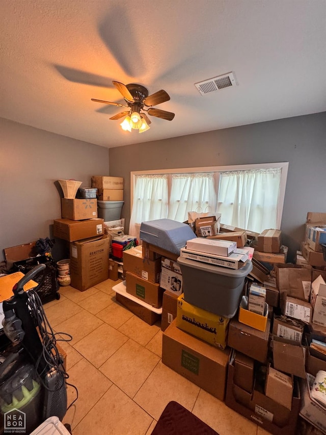 storage room with a ceiling fan and visible vents
