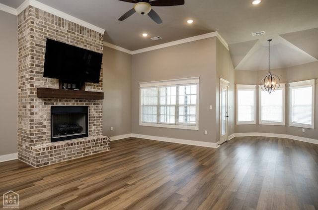 unfurnished living room featuring dark wood-style flooring, a fireplace, ceiling fan with notable chandelier, recessed lighting, and baseboards