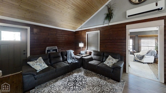 living room with vaulted ceiling, wooden walls, a wall unit AC, wooden ceiling, and wood finished floors