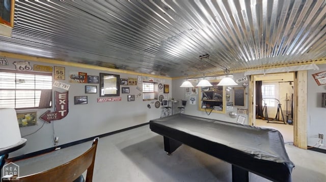 game room featuring billiards and finished concrete flooring