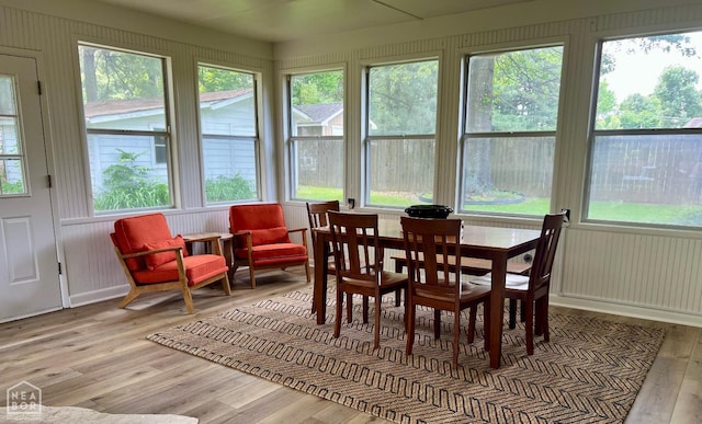 104 N Hunter Ln N, Jonesboro, AR 72405 - sunroom / solarium featuring wood finished floors and healthy amount of natural light