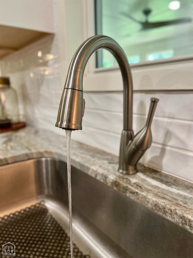 104 N Hunter Ln N, Jonesboro, AR 72405 - kitchen view of a sink and light stone counters