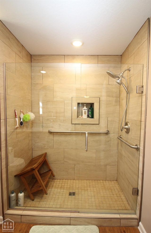 bathroom with a stall shower