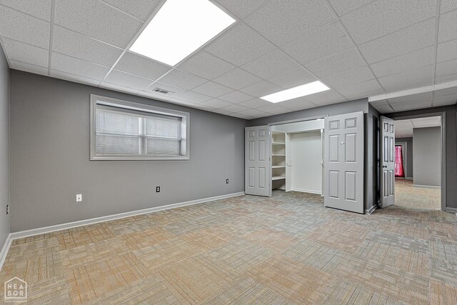2101 Belleview Cv, Jonesboro, AR 72404 - basement featuring visible vents, baseboards, and a drop ceiling
