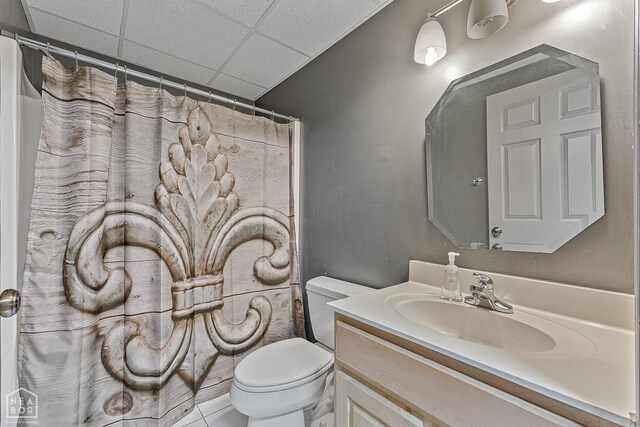 2101 Belleview Cv, Jonesboro, AR 72404 - bathroom with toilet, curtained shower, a drop ceiling, and vanity