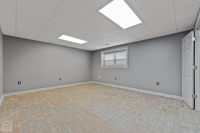 2101 Belleview Cv, Jonesboro, AR 72404 - spare room featuring visible vents, baseboards, and a paneled ceiling