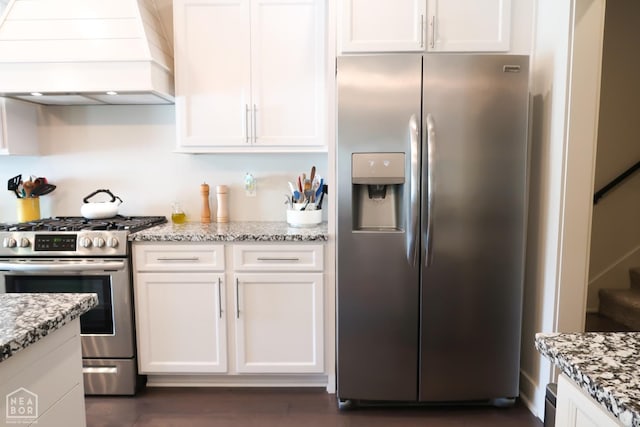 3997 Hwy 351, Jonesboro, AR 72405 - kitchen featuring stainless steel appliances, custom exhaust hood, white cabinets, and light stone counters