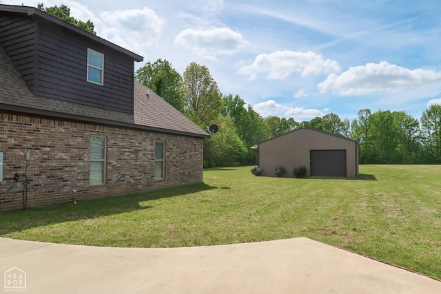 3997 Hwy 351, Jonesboro, AR 72405 - view of green lawn with a garage and an outbuilding