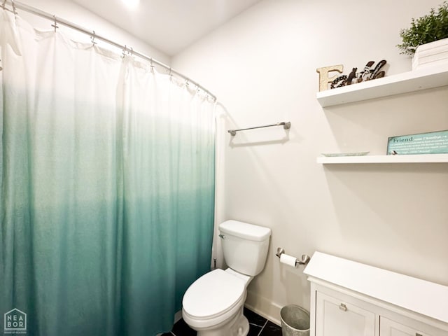 3997 Hwy 351, Jonesboro, AR 72405 - full bath with toilet, baseboards, tile patterned flooring, and curtained shower