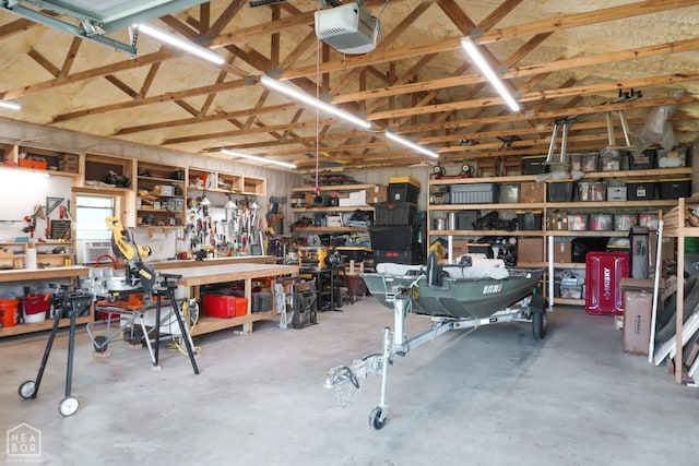 3997 Hwy 351, Jonesboro, AR 72405 - garage with a garage door opener and a workshop area