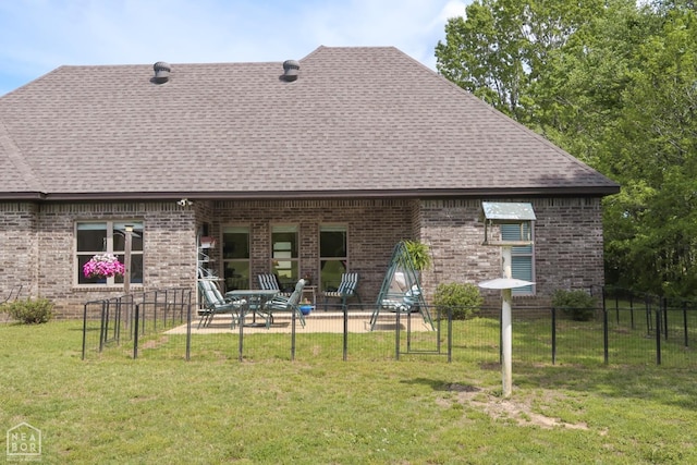 3997 Hwy 351, Jonesboro, AR 72405 - rear view of property featuring a shingled roof, a patio area, and brick siding