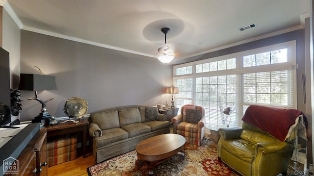 3102 Sara Creek Dr, Jonesboro, AR 72401 - living area featuring ornamental molding, wood finished floors, and ceiling fan