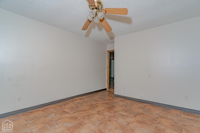 812 Glendale St, Jonesboro, AR 72401 - empty room featuring a textured ceiling, a ceiling fan, and baseboards