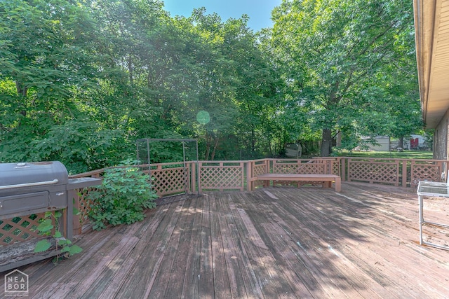 812 Glendale St, Jonesboro, AR 72401 - wooden terrace with area for grilling