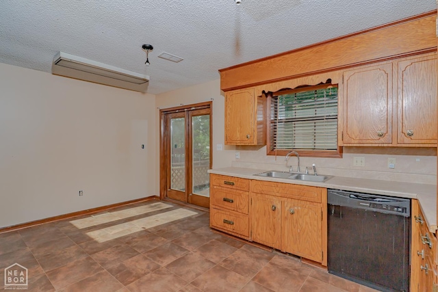 812 Glendale St, Jonesboro, AR 72401 - kitchen featuring dishwasher, a sink, light countertops, a textured ceiling, and baseboards