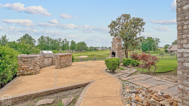 4217 Lochmoor Cir, Jonesboro, AR 72405 - view of patio / terrace with golf course view