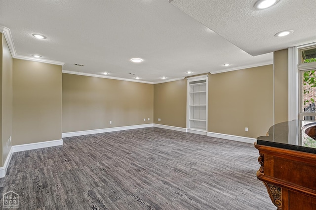 4217 Lochmoor Cir, Jonesboro, AR 72405 - spare room with a textured ceiling, wood finished floors, crown molding, baseboards, and recessed lighting