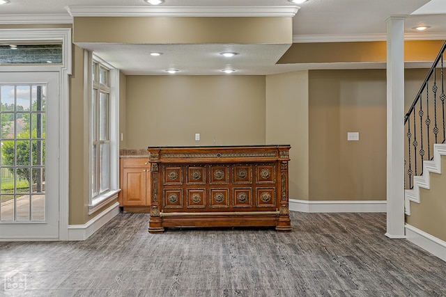 4217 Lochmoor Cir, Jonesboro, AR 72405 - below grade area with stairs, baseboards, crown molding, wood finished floors, and recessed lighting