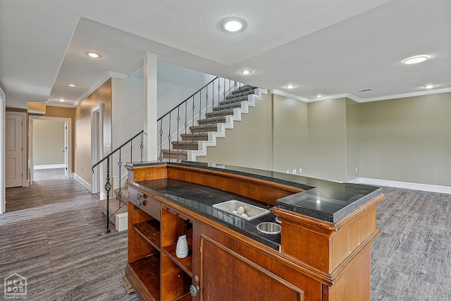 4217 Lochmoor Cir, Jonesboro, AR 72405 - bar with baseboards, ornamental molding, dark wood-style floors, stairway, and recessed lighting
