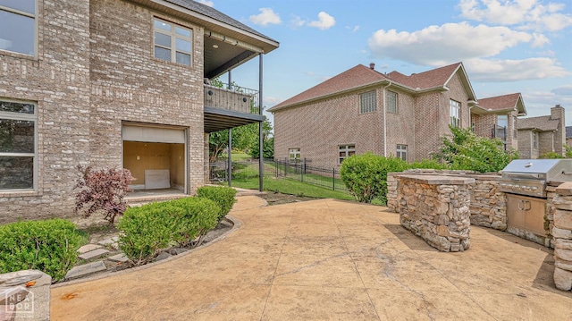 4217 Lochmoor Cir, Jonesboro, AR 72405 - view of patio with a balcony and a garage