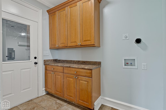 4217 Lochmoor Cir, Jonesboro, AR 72405 - laundry room with hookup for a washing machine, cabinet space, baseboards, hookup for an electric dryer, and ornamental molding