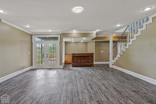 4217 Lochmoor Cir, Jonesboro, AR 72405 - below grade area featuring crown molding, dark wood finished floors, baseboards, stairs, and a textured ceiling