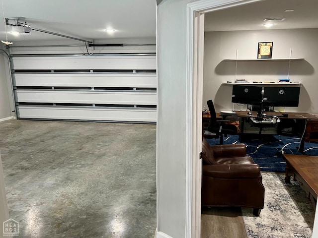 5204 Bridger Park Ct, Jonesboro, AR 72405 - garage with a garage door opener and an office area