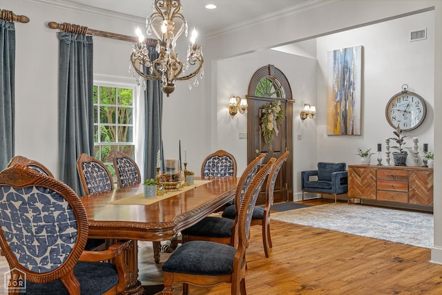 3500 Big Creek Cv, Jonesboro, AR 72404 - dining space with a chandelier, light wood-style floors, crown molding, and recessed lighting