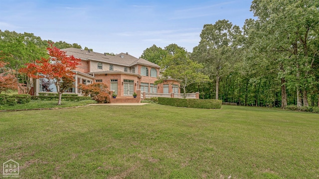 3500 Big Creek Cv, Jonesboro, AR 72404 - rear view of property with a yard and brick siding
