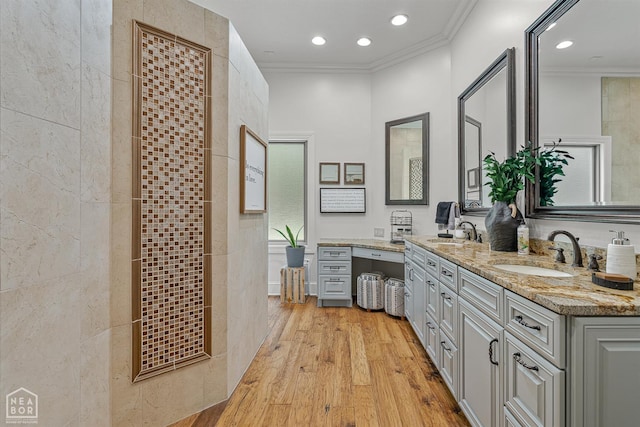 3500 Big Creek Cv, Jonesboro, AR 72404 - full bathroom with double vanity, wood finished floors, recessed lighting, and ornamental molding