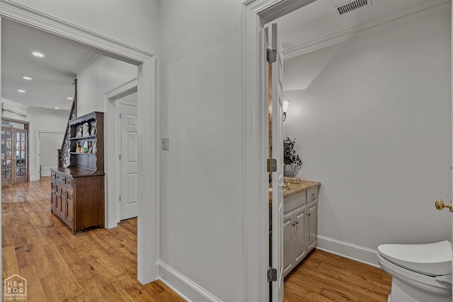 3500 Big Creek Cv, Jonesboro, AR 72404 - corridor with ornamental molding, light wood-style floors, and recessed lighting