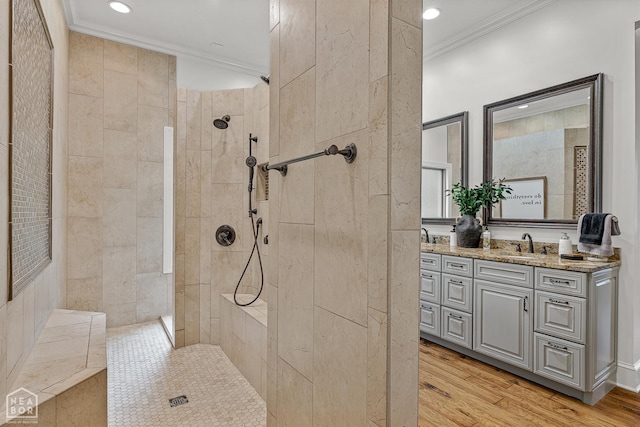 3500 Big Creek Cv, Jonesboro, AR 72404 - full bath with ornamental molding, vanity, walk in shower, wood finished floors, and recessed lighting