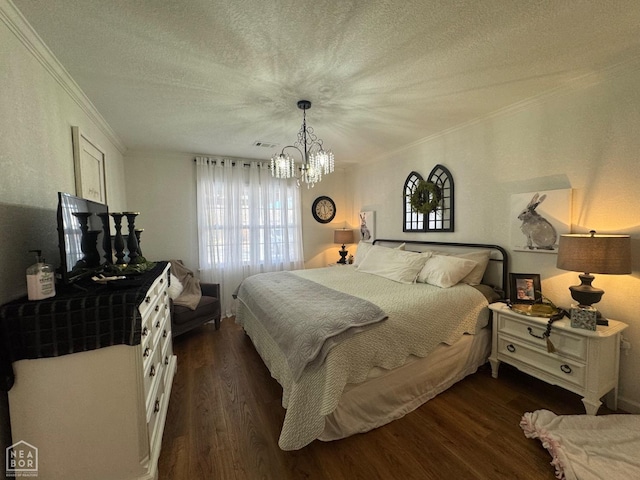 bedroom with a textured ceiling, an inviting chandelier, dark wood-style floors, and visible vents