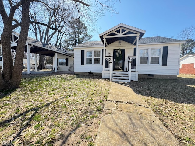 bungalow-style home with crawl space and roof with shingles