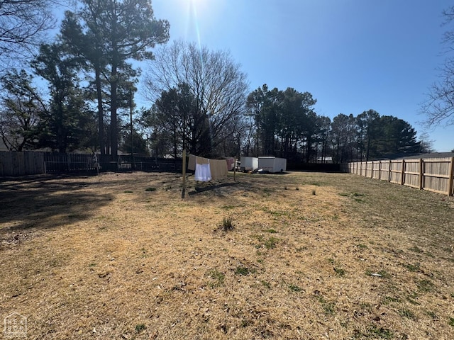 view of yard with fence