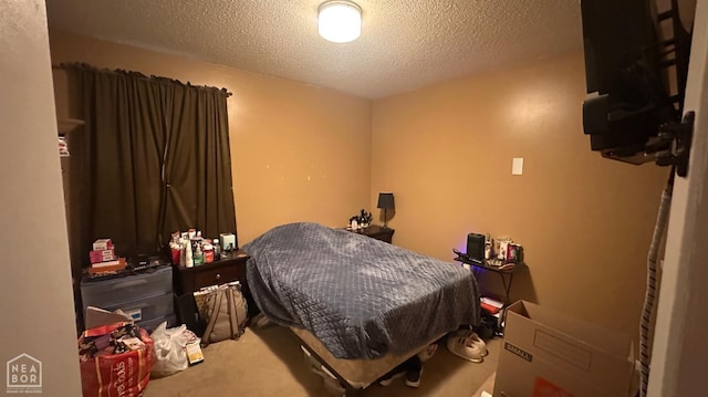 1703 W Oak Ave, Jonesboro, AR 72401 - bedroom featuring a textured ceiling