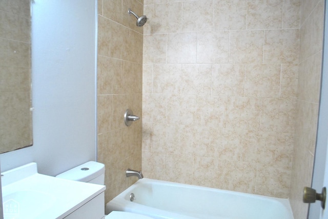 bathroom with vanity, shower / tub combination, and toilet