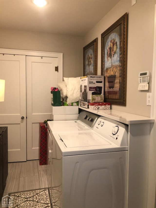 laundry room featuring laundry area and washer and clothes dryer