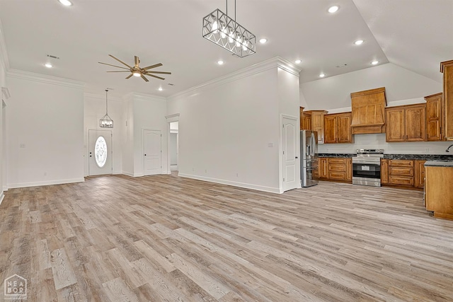 610 Airport Rd, Jonesboro, AR 72405 - kitchen with appliances with stainless steel finishes, open floor plan, dark countertops, brown cabinetry, and recessed lighting