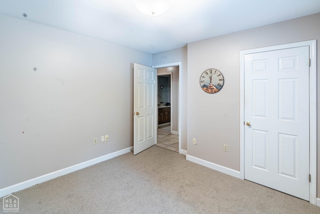 304 E Ridge Dr, West Helena, AR 72390 - unfurnished bedroom with carpet floors and baseboards