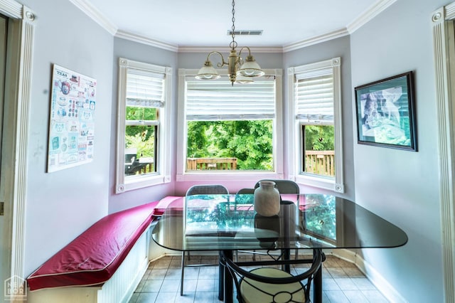 304 E Ridge Dr, West Helena, AR 72390 - tiled dining space featuring a chandelier, ornamental molding, and baseboards