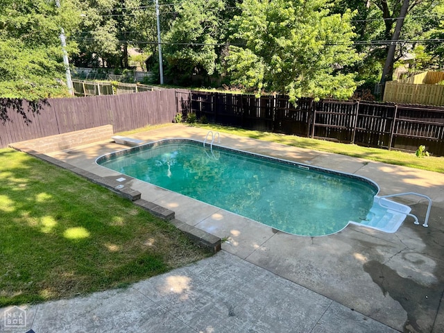 1804 Deerwood Dr, Jonesboro, AR 72404 - view of swimming pool with a fenced backyard, a diving board, and a patio area