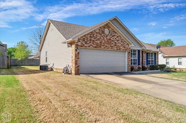 301 Natchez Dr, Jonesboro, AR 72404 - single story home featuring concrete driveway, cooling unit, an attached garage, brick siding, and fence