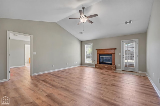 301 Natchez Dr, Jonesboro, AR 72404 - unfurnished living room featuring light wood-style floors, a ceiling fan, visible vents, and a wealth of natural light