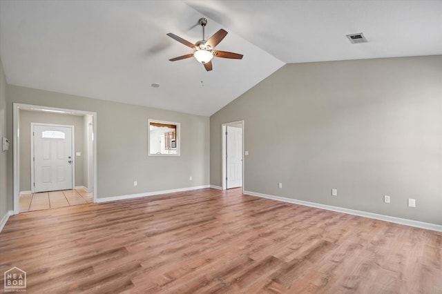 301 Natchez Dr, Jonesboro, AR 72404 - interior space with a ceiling fan, visible vents, lofted ceiling, light wood finished floors, and baseboards